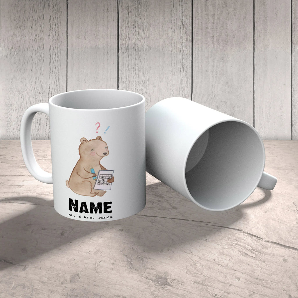 Personalisierte Tasse Bär Rätsel lösen Namen, Wunschname, Tasse, Personalisierte Tasse, Personalisiert, Tasse mit Namen, Namenstasse, Drucken, Geschenk, Sport, Sportart, Hobby, Schenken, Danke, Dankeschön, Auszeichnung, Gewinn, Sportler, Knobeln, Kreuzworträtsel lösen, Gedächtnissport, Rätsel lösen, Gedächtnistraining