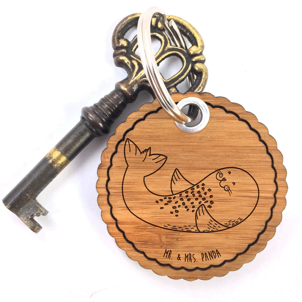 Rundwelle Schlüsselanhänger Robbe liegend Glücksbringer, Schlüsselanhänger, Anhänger, Schlüsselband, Taschenanhänger, Tiermotive, Gute Laune, lustige Sprüche, Tiere, Robben, Nordsee, Strand, Lachen, Robbe, Seehund, Freude, Ostsee, Meerestier