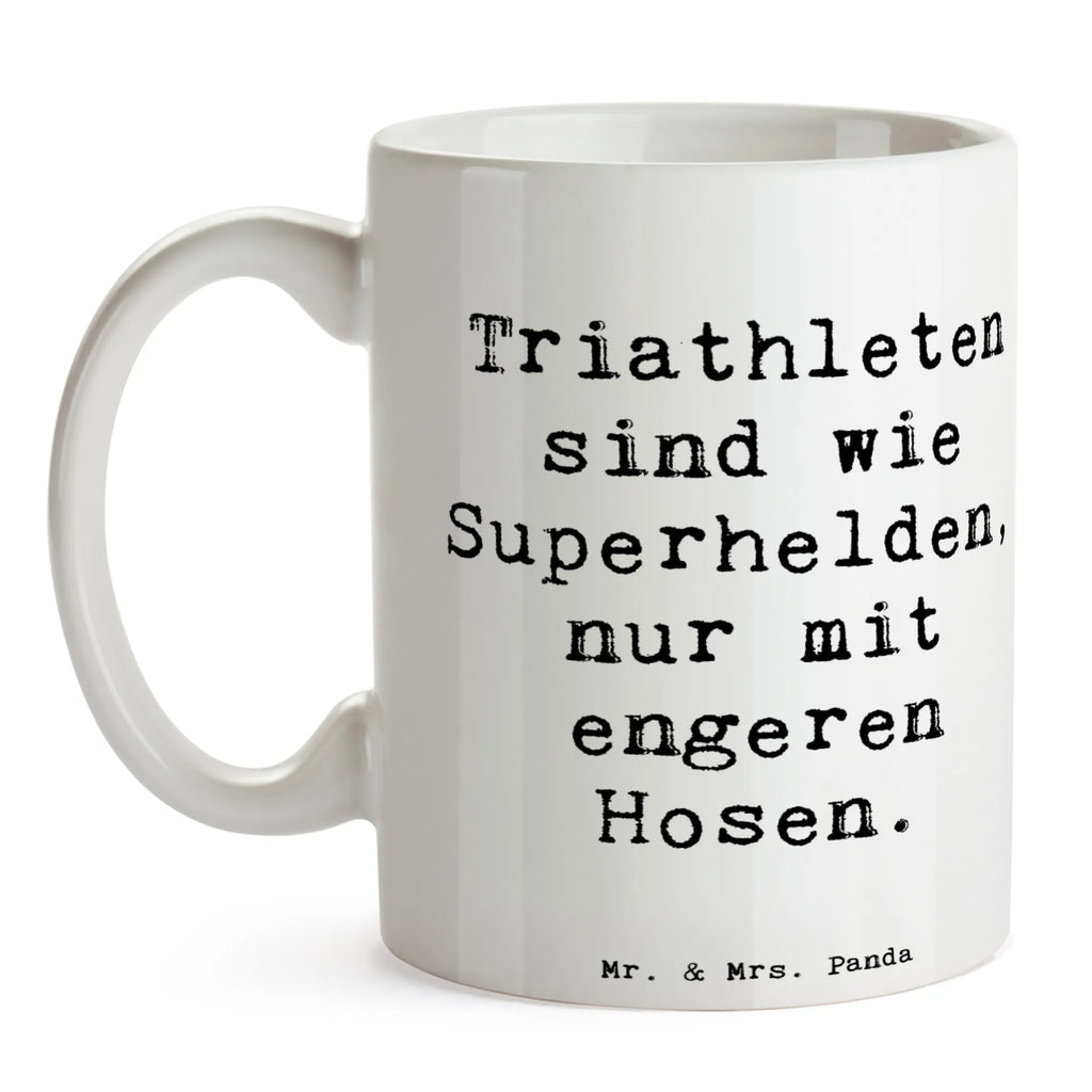 Mug Saying Triathleten sind wie Superhelden, nur mit engeren Hosen. Kaffeetasse, Tasse mit Motiven, Tasse mit Zitaten, Porzellantasse, Bürotasse, Geschenktasse, Tasse, Teetasse, Keramiktasse, Geschenk, Sport, Sportart, Hobby, Schenken, Danke, Dankeschön, Auszeichnung, Gewinn, Sportler