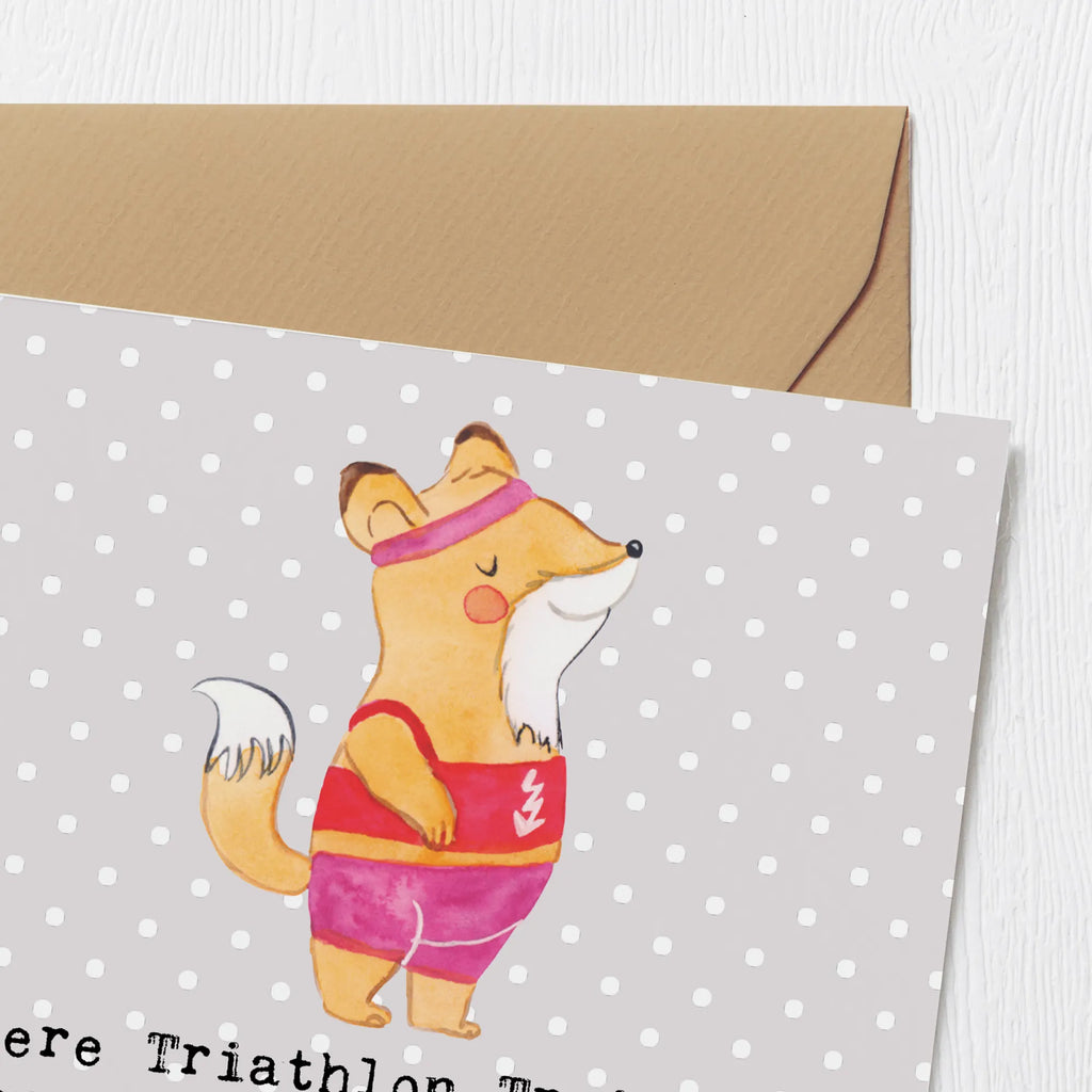 Deluxe Card Unsere Triathlon Trainerin ist unser Motivationsmotor - Danke für die Energie und Inspiration auf jedem Kilometer! Glückwunschkarte, Klappkarte, Karte, Grußkarte, Hochwertige Klappkarte, Einladungskarte, Hochwertige Grußkarte, Geburtstagskarte, Hochzeitskarte, Geschenk, Sport, Sportart, Hobby, Schenken, Danke, Dankeschön, Auszeichnung, Gewinn, Sportler