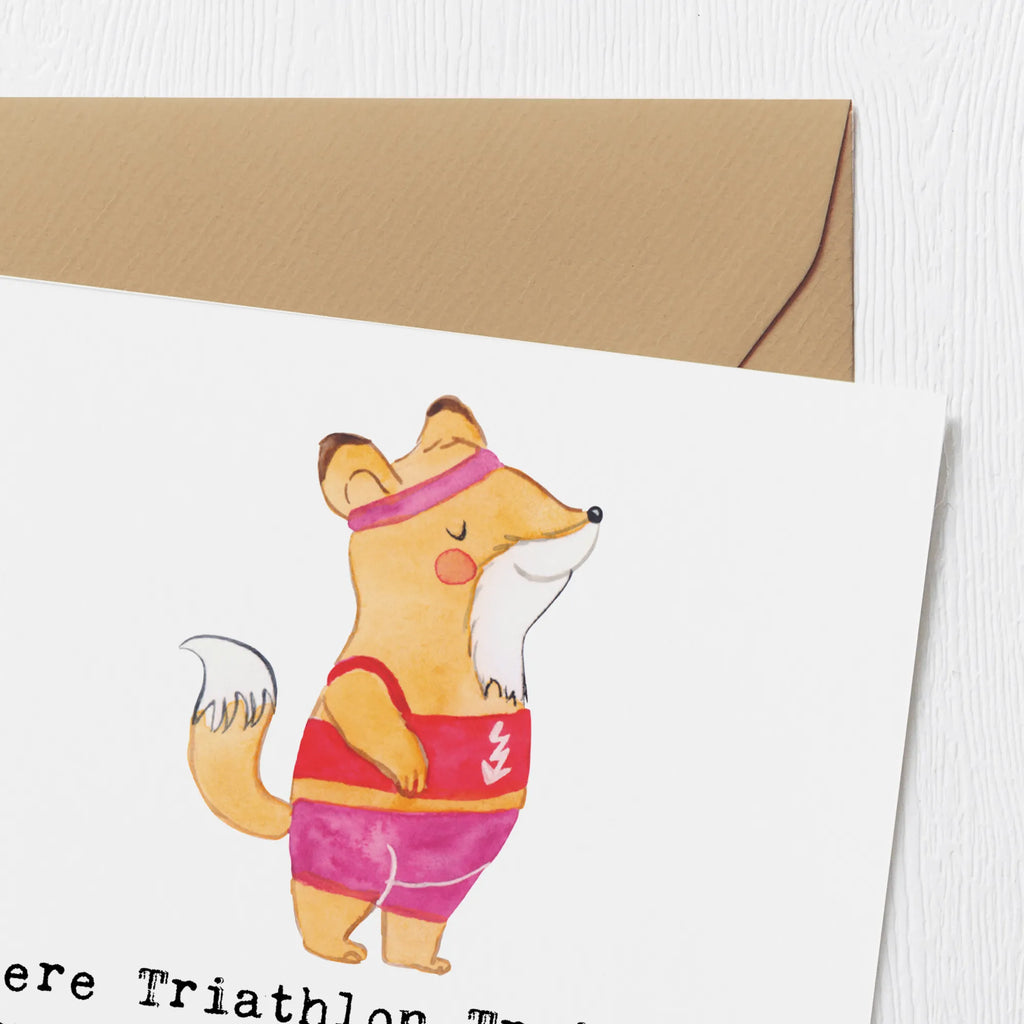 Deluxe Card Unsere Triathlon Trainerin ist unser Motivationsmotor - Danke für die Energie und Inspiration auf jedem Kilometer! Glückwunschkarte, Klappkarte, Karte, Grußkarte, Hochwertige Klappkarte, Einladungskarte, Hochwertige Grußkarte, Geburtstagskarte, Hochzeitskarte, Geschenk, Sport, Sportart, Hobby, Schenken, Danke, Dankeschön, Auszeichnung, Gewinn, Sportler