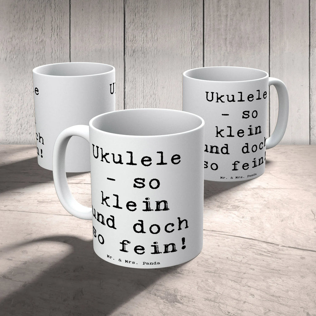 Mug Saying Ukulele - so klein und doch so fein! Teetasse, Tasse, Kaffeetasse, Bürotasse, Geschenktasse, Tasse mit Motiven, Tasse mit Zitaten, Keramiktasse, Porzellantasse, Instrumente, Geschenke Musiker, Musikliebhaber