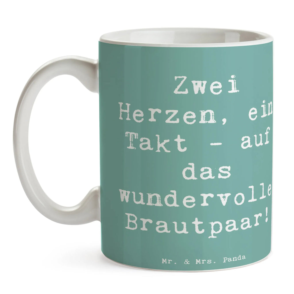 Mug Saying Zwei Herzen, ein Takt - auf das wundervolle Brautpaar! haferl, Motivtasse, Kaffeetasse, Bedruckte Tasse, Kaffeepott, statement tasse, tasse für büro, Keramikbecher, hochwertige tasse, Teepott, Tasse mit Spruch, Bürotasse, Kaffeebecher, Dekotasse, Mug, Tasse, kaffeetasse keramik, tasse für kaffee, Coffee Mug, kaffeetasse bedruckt, heißgetränkebecher, milchkaffeetasse, Trinktasse, Trinkbecher, Tasse mit Motiv, Designtasse, Bürobecher, Teebecher, design tasse, Geschenktasse, Pott, Keramiktasse, kaffeebecher bedruckt, Teetasse, Becher, Henkeltasse, Frühstücksbecher, Sprüchetasse, Kakaotasse, schöne tasse, kaffeebecher keramik, Henkelbecher, Frühstückstasse, Hochzeitsgeschenk, Hochzeit, Trauungsgeschenk, Hochzeitsgeschenke für Brautpaar, Hochzeitsgeschenkideen, Hochzeitsfeier, Verlobungsfeier, Hochzeitskarte, Verlobungsgeschenk, Trauung, Ehe