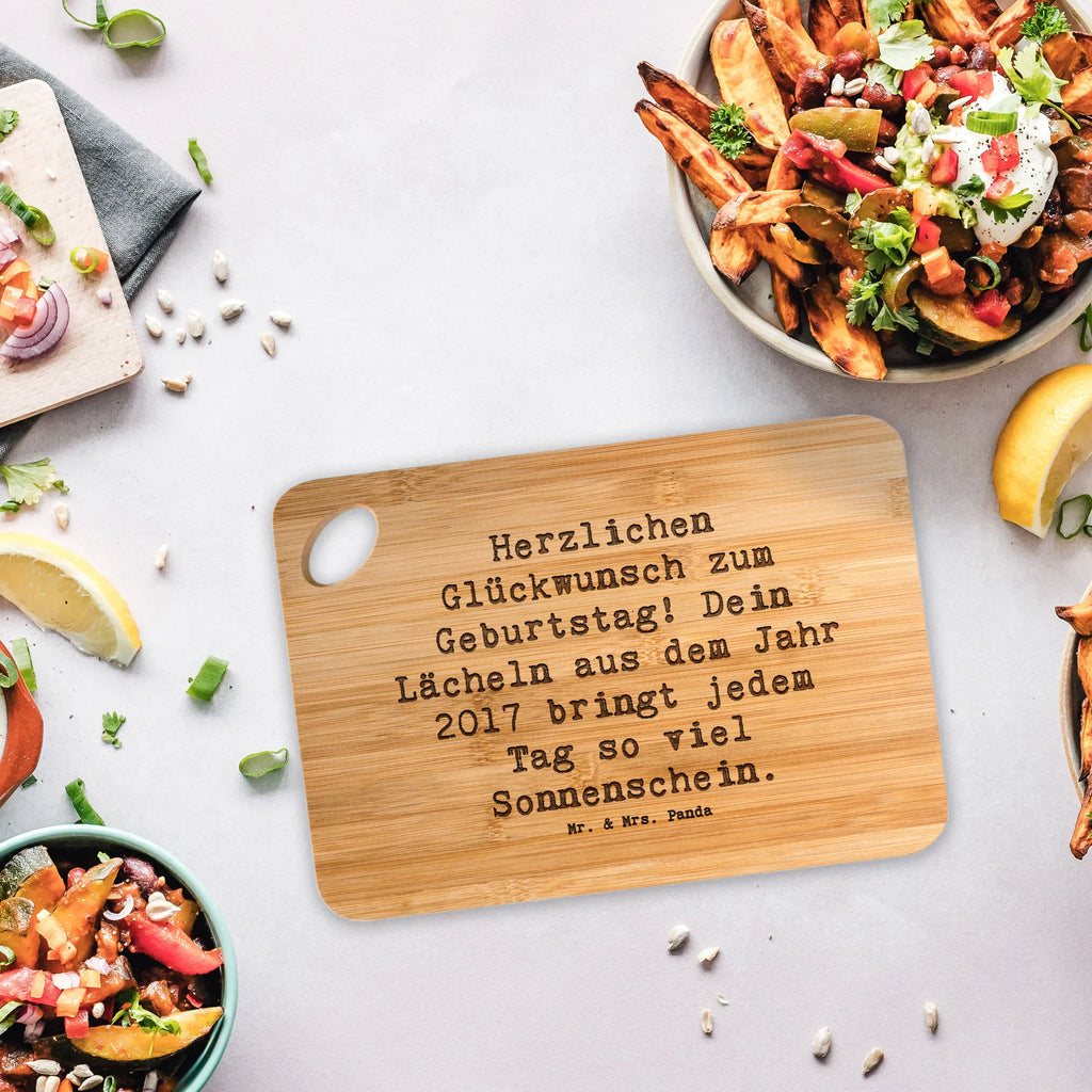 Bamboo chopping board Saying Herzlichen Glückwunsch zum Geburtstag! Dein Lächeln aus dem Jahr 2017 bringt jedem Tag so viel Sonnenschein. cutting board, kitchen, robust, slices, cutting block, nature, kitchen board, breakfast board, engraving, breakfast, board, carving board, bamboo, wood, solid, dulcimer, Birthday, celebration, party, birthday party, friends, family, birthday wish, birthday present, birthday cards, 18th birthday, 30th birthday, 40th, 50th, 60th, 70th, 80th, 90th, 90th., gift ideas, gifts for girlfriend, boyfriend, mom, dad, brother, sister, congratulations, funny, sayings, 1 year, money gifts, guest gifts, gifts online, gift basket, special gifts, unusual gifts, extraordinary gifts, gift package, original gifts, gift items, special birthday gifts