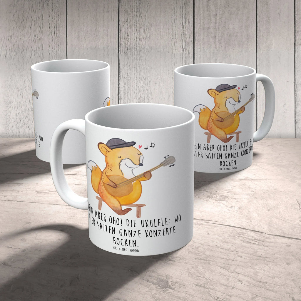 Mug Klein aber oho! Die Ukulele: wo vier Saiten ganze Konzerte rocken. Tasse, Kaffeetasse, Teetasse, Porzellantasse, Bürotasse, Keramiktasse, Geschenktasse, Tasse mit Motiven, Tasse mit Zitaten, Instrumente, Geschenke Musiker, Musikliebhaber