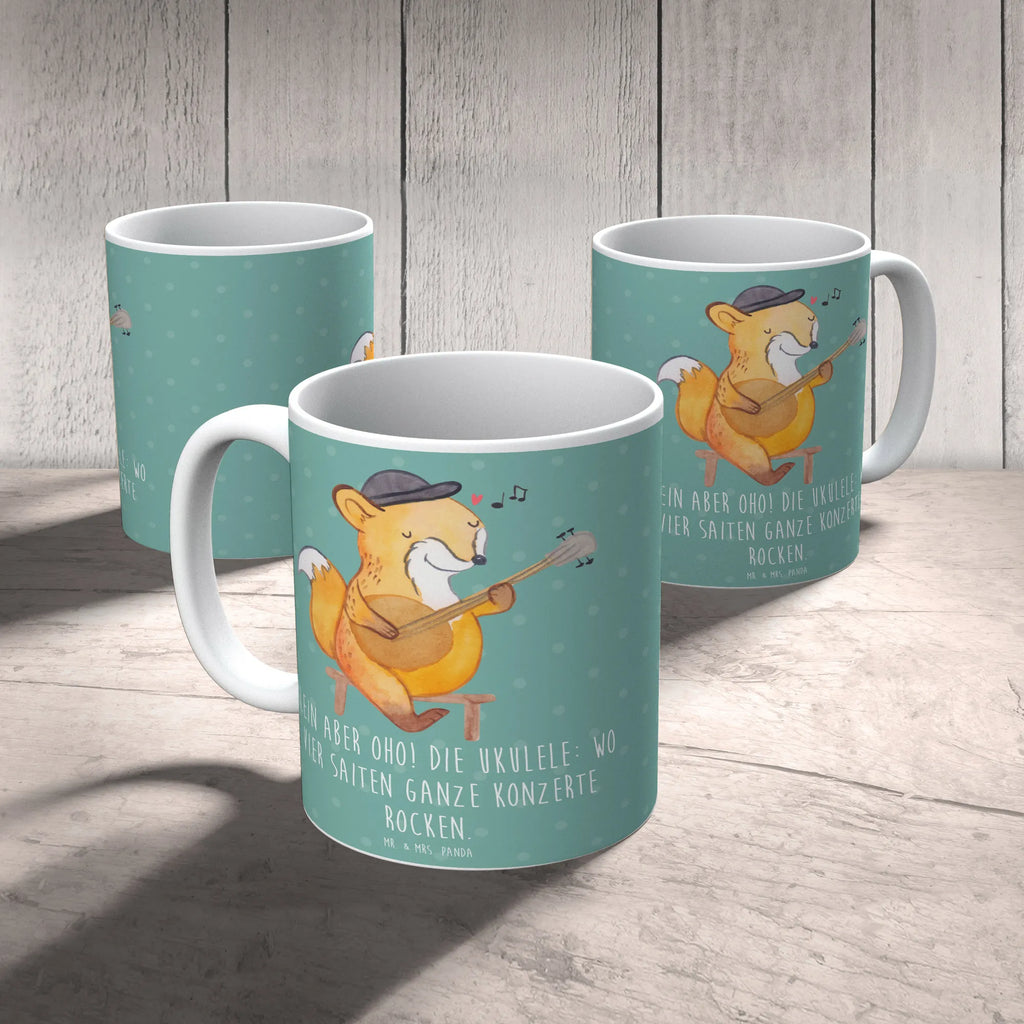 Mug Klein aber oho! Die Ukulele: wo vier Saiten ganze Konzerte rocken. Tasse, Kaffeetasse, Teetasse, Porzellantasse, Bürotasse, Keramiktasse, Geschenktasse, Tasse mit Motiven, Tasse mit Zitaten, Instrumente, Geschenke Musiker, Musikliebhaber