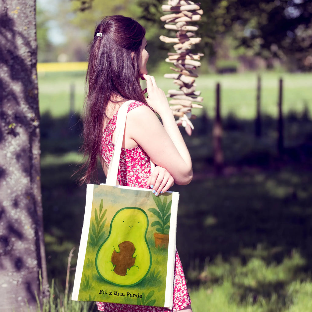 Tragetasche Avocado Kern Design Einkaufstüte, Jutetasche, Stoffbeutel, Strandtasche, Badetasche, Stofftasche, Umhängetasche, Beutel, Schultertasche, Beuteltasche, Jutebeutel, Tasche, Shopper, Einkaufstasche, Tragetasche, Laptoptasche, Avocado, Veggie, Vegan, Gesund, Avocadokern, Pflanze, Avokado, Kern, Spruch Leben