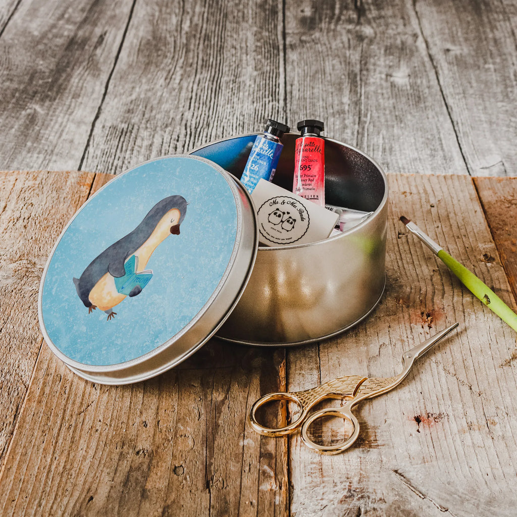 okrągła puszka z blachy pingwin książka Pinguin